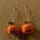 Thumbnail: dangle earrings of jack-o-lantern pumpkins