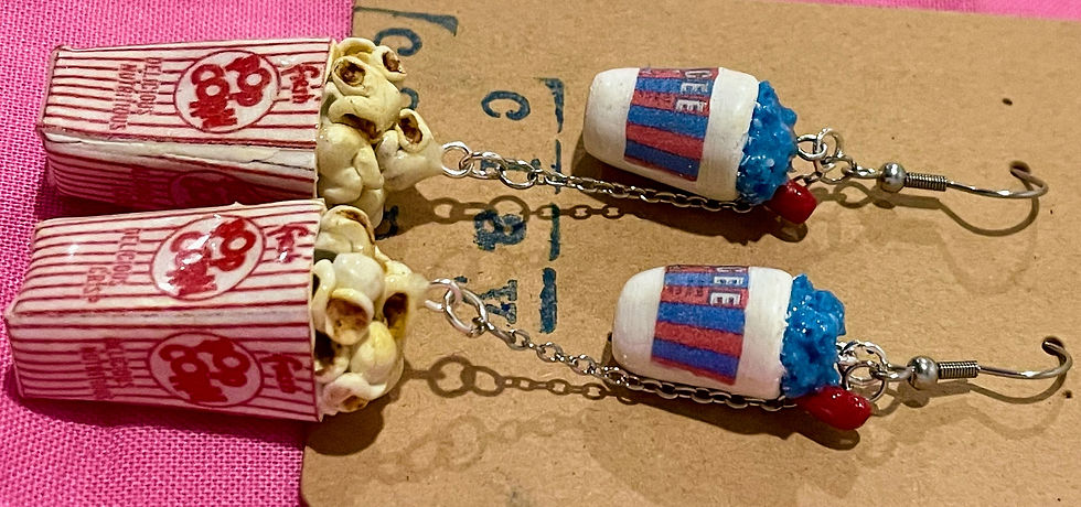 Thumbnail: dangle earrings of popcorn in a red and white striped popcorn box with a blueberry icee slushee