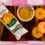 Thumbnail: fridge magnet of a Tropicana orange juice box and three orange slices with a glass of orange juice on a wooden cutting board