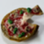 magnet of mushroom and peppers pizza with a floating pulled pizza slice with pulled cheese