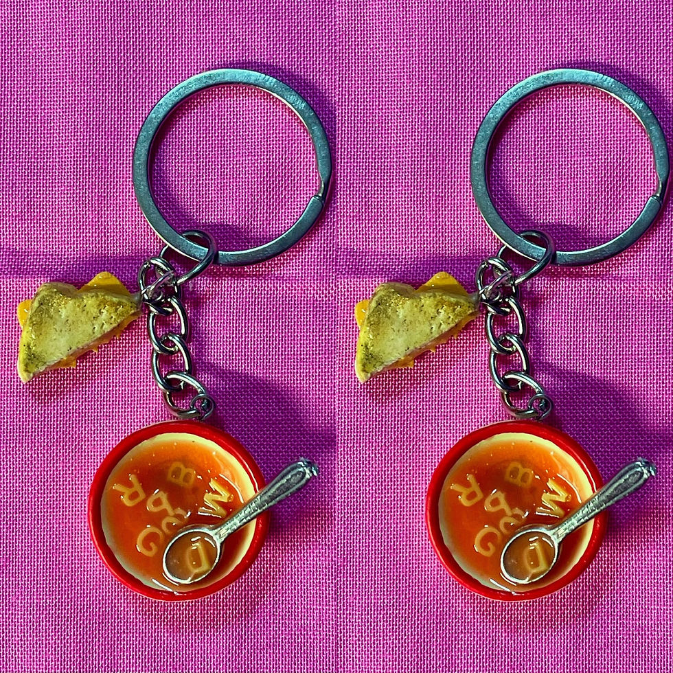 keychain of red alphabet soup with tiny spoons with grilled cheese slices and melted cheese