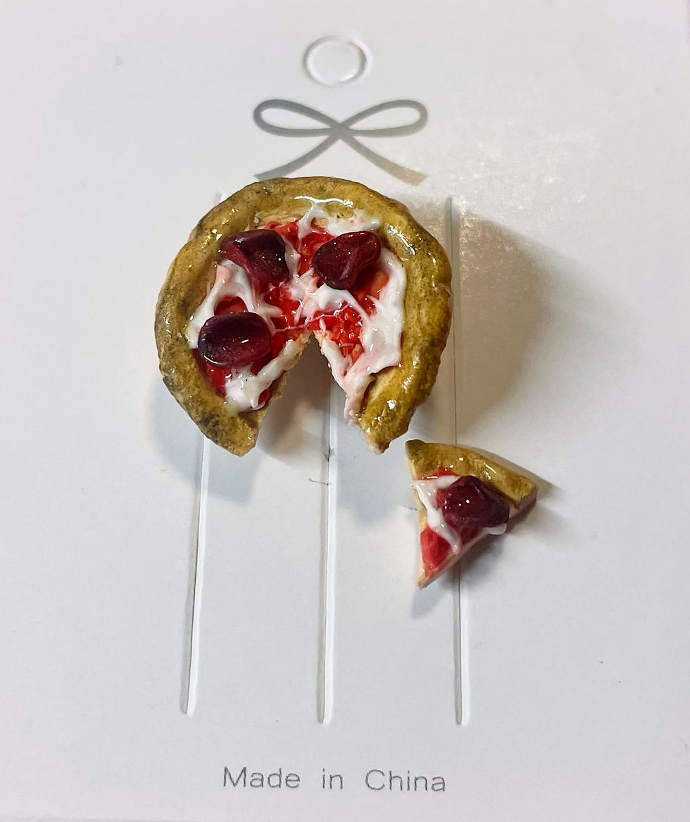 lapel pin of a peperoni pizza with a slice missing and the slice missing is it's own lapel pin