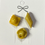 Thumbnail: lapel pins of 3 types of pasta including a tortellini pin, a ravioli pin and a penne pin