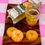 Thumbnail: fridge magnet of a Tropicana orange juice box and three orange slices with a glass of orange juice on a wooden cutting board