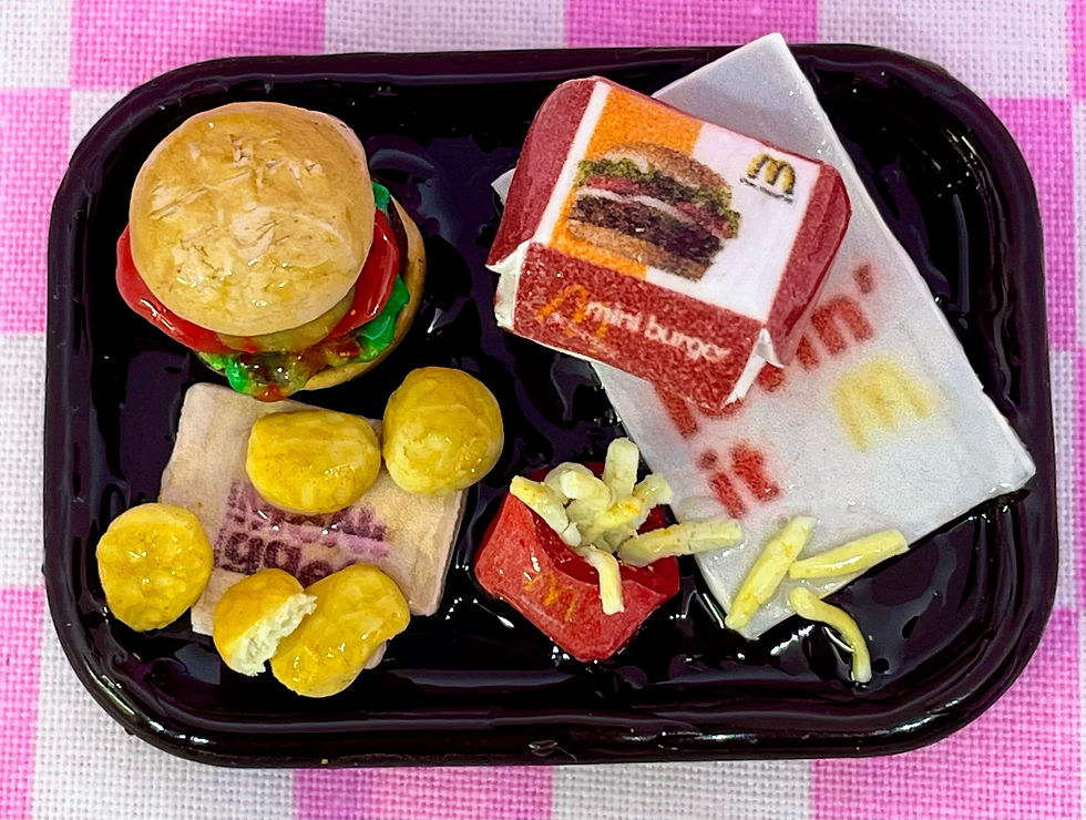 fridge magnet of a McDonald's big mac burger on a brown tray with a big mac box on top of a McDonald's paper bag with chicken