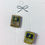 Thumbnail: lapel pins of two pokemon cards including pikachu and raichu