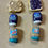 Thumbnail: stud earrings of smuckers grape jelly jars and skippy peanut butter jars and slices of bread with peanut butter and jelly
