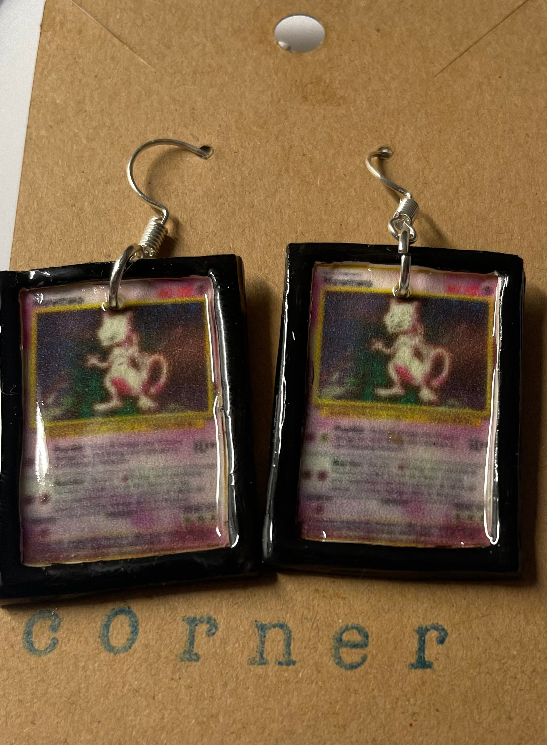 dangle earrings of mew two pokemon cards in a black frame