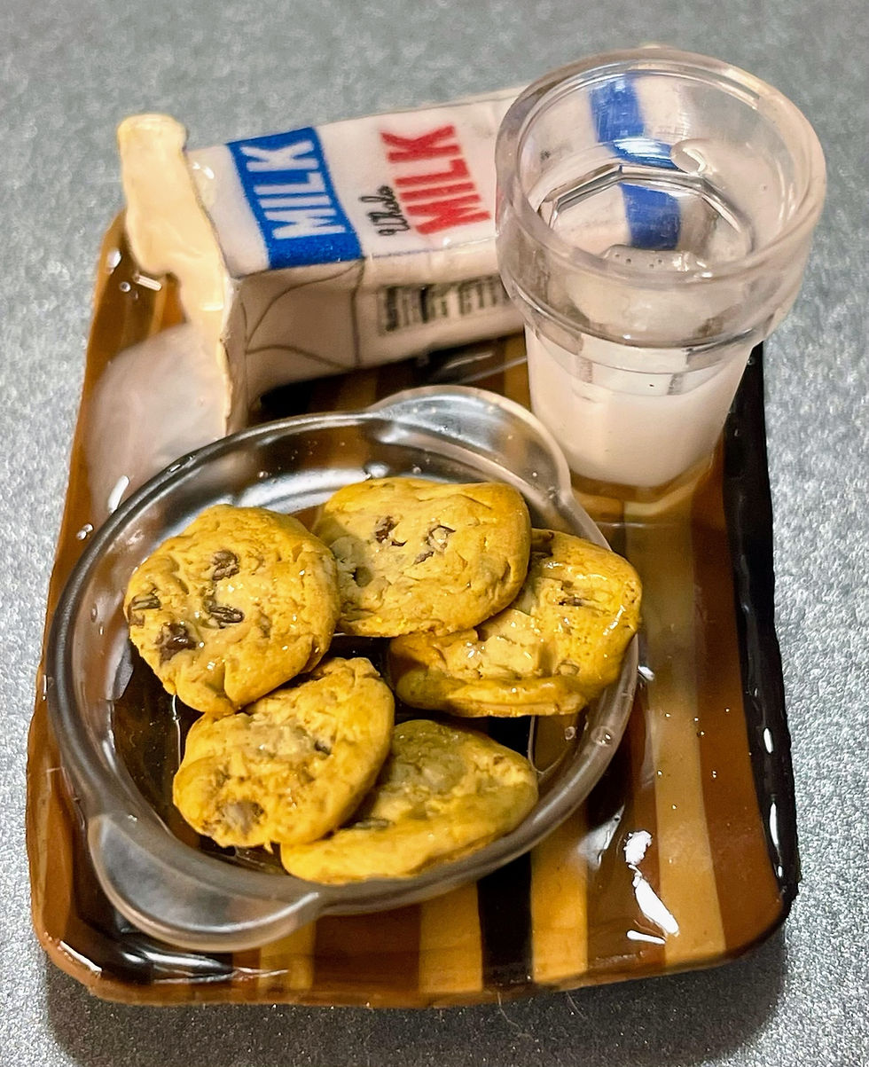 Thumbnail: magnet of a wooden cutting board with a carton of spilled milk and a bowl of chocolate chip cookies with a glass of milk