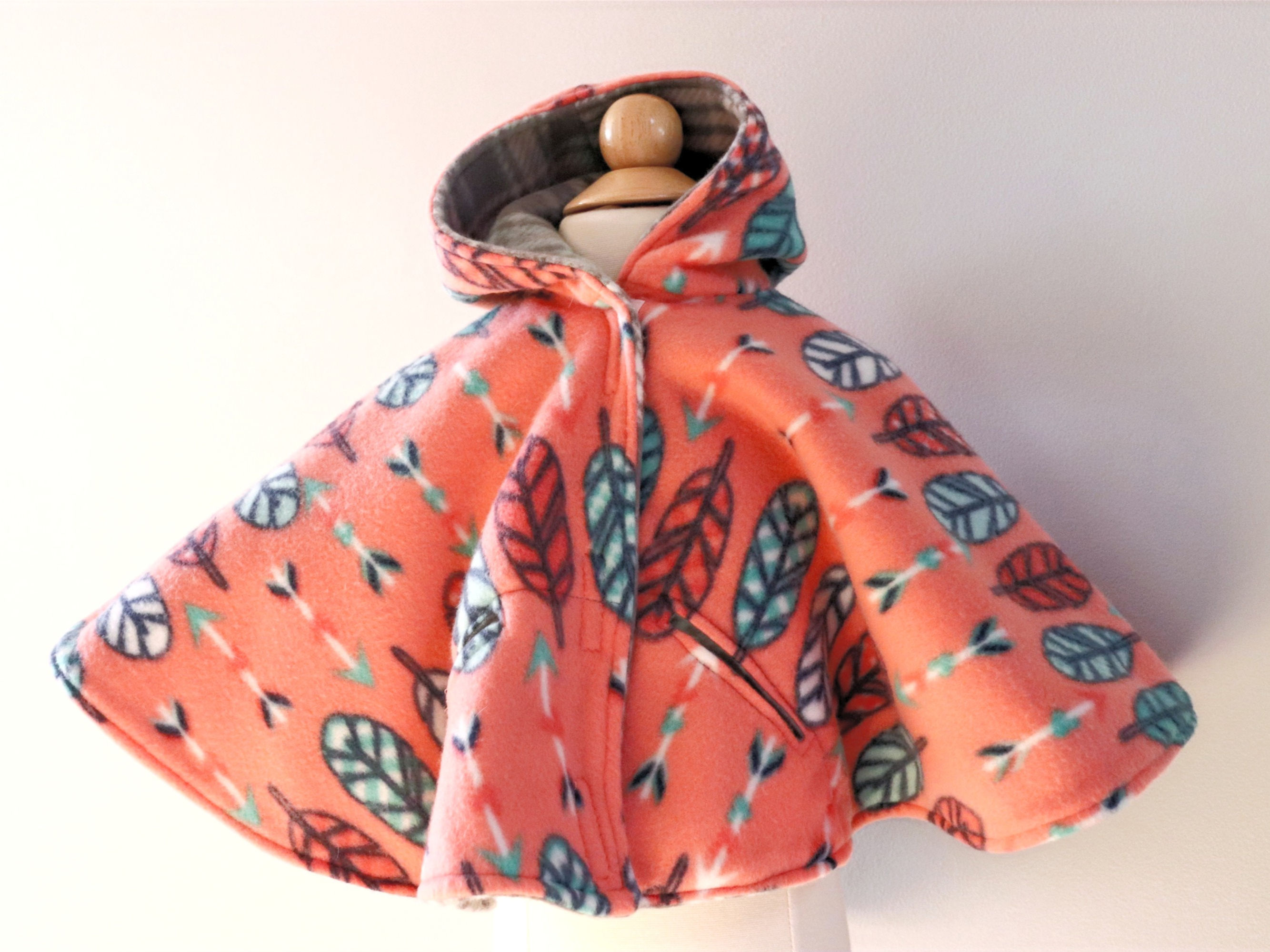 Coral with feather and arrow print 2-Layer Fleece Car Seat Poncho