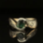 Western ring with emerald stone