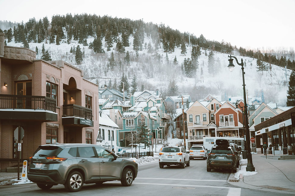 Charming winter street with colorful houses and cars in Park City, Utah..jpg