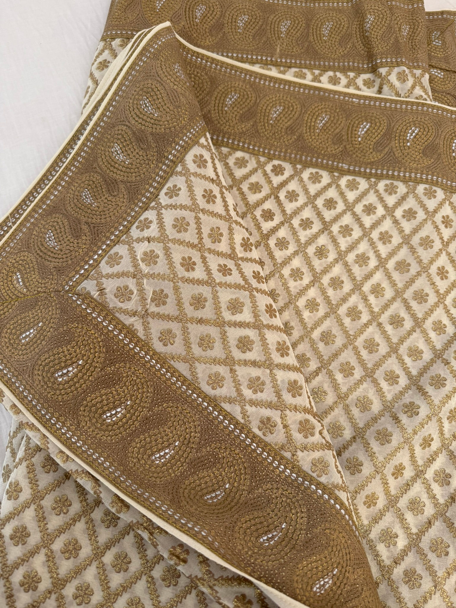 Gorgeous Off-white Georgette with Gold Print Saree with Blouse