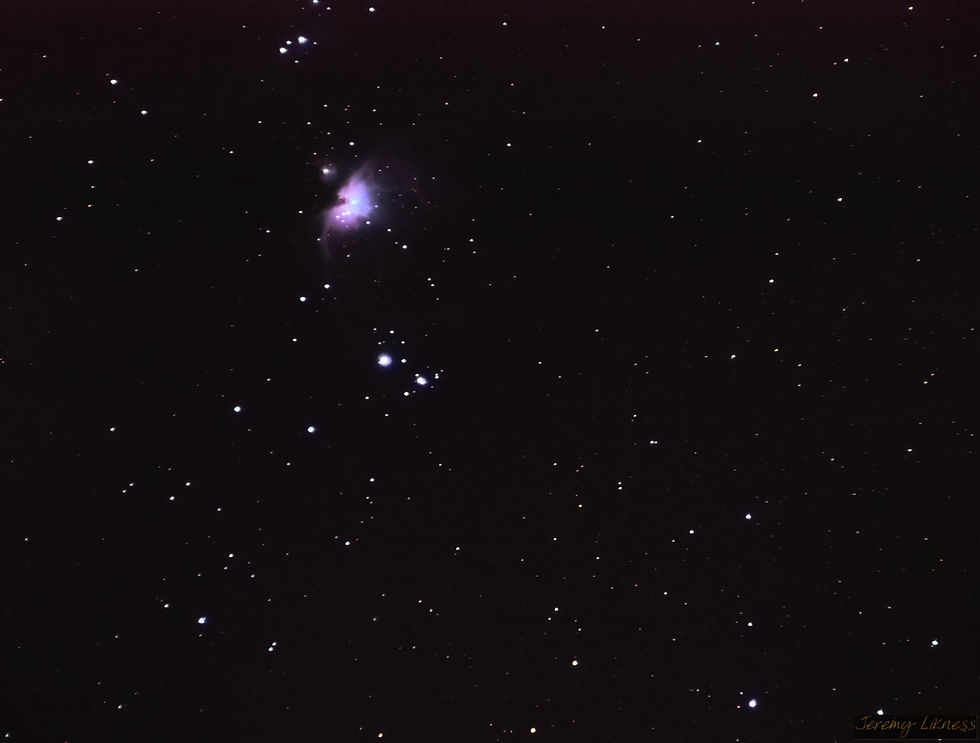 Stars and a pink nebula