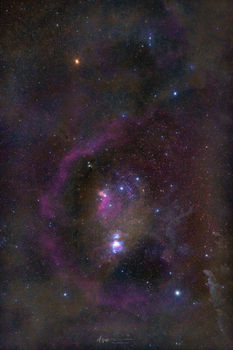 A strikingly vibrant and detailed view of Orion including its colorful stars and detailed nebulae.