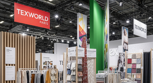 Vibrant panoramic view of Texworld Paris 2025, showcasing diverse textile displays, fabric samples, and professionals networking in a modern expo hall.