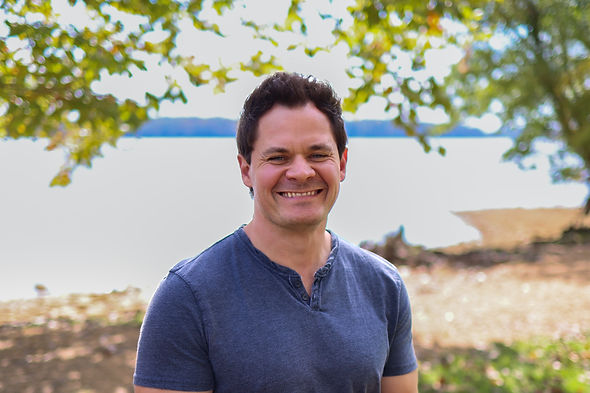 Mark smiling outdoors