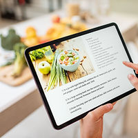 Women cooking viewing recipe e-book on ipad.jpg