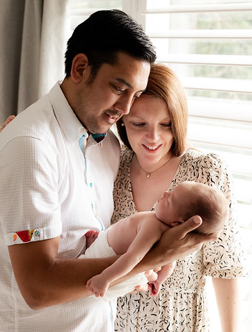 Mum and dad with newborn baby photoshoot