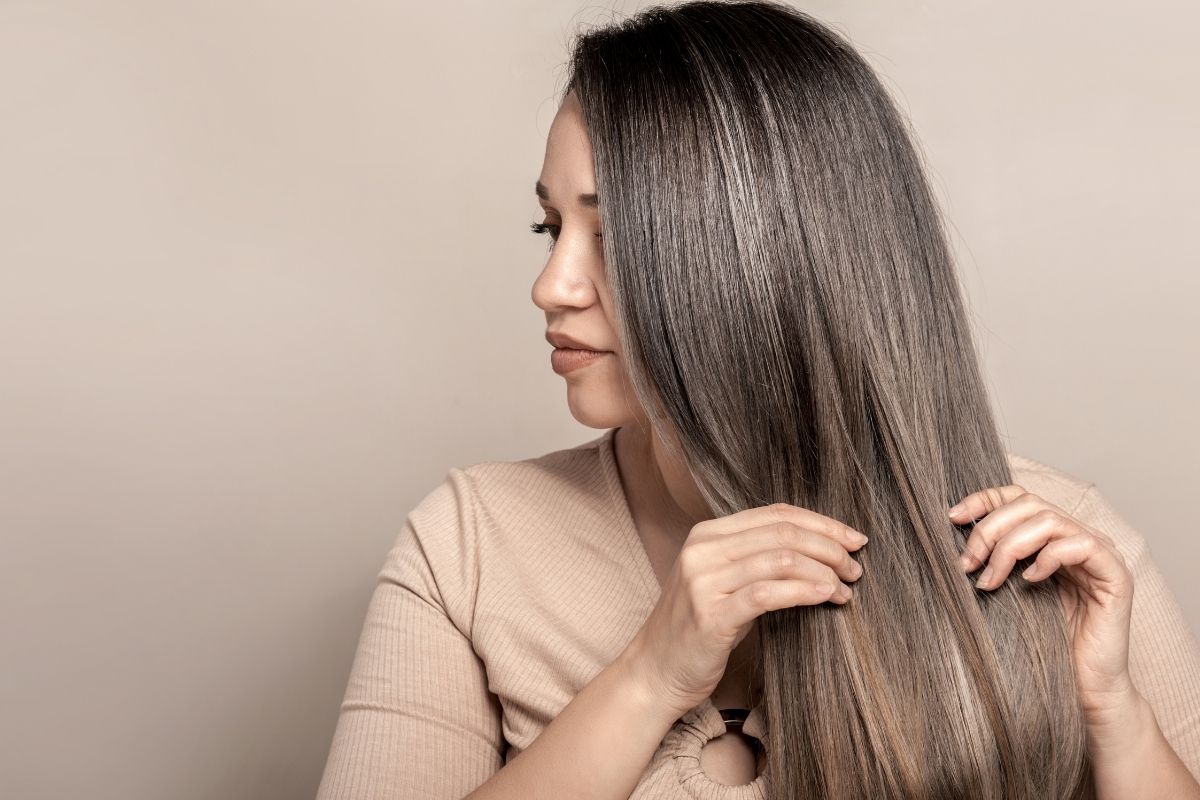 A client with a healthy, dandruff-free scalp after completing treatment at Skin 104.