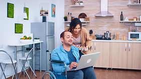 disabled-man-in-wheelchair-using-laptop-2025-02-17-17-01-20-utc.jpg