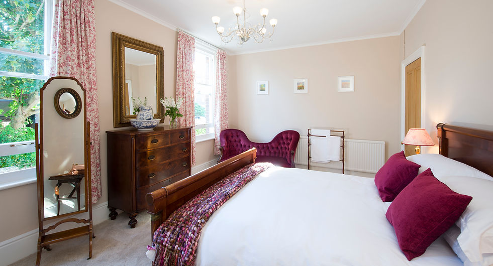 Luxurious master bedroom with Simon Horn kingsize bed with goose down duvet