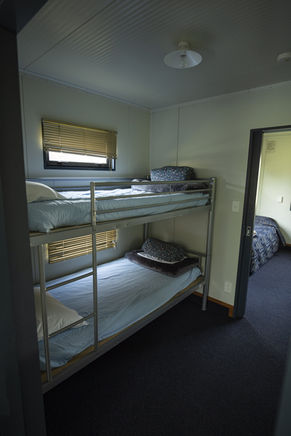 Two Bedroom Standard Cottage Sleeping Area - Alexandra Holiday Park