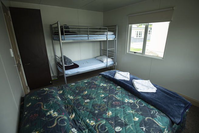 One Bedroom Cottage Sleeping Area -Alexandra Holiday Park