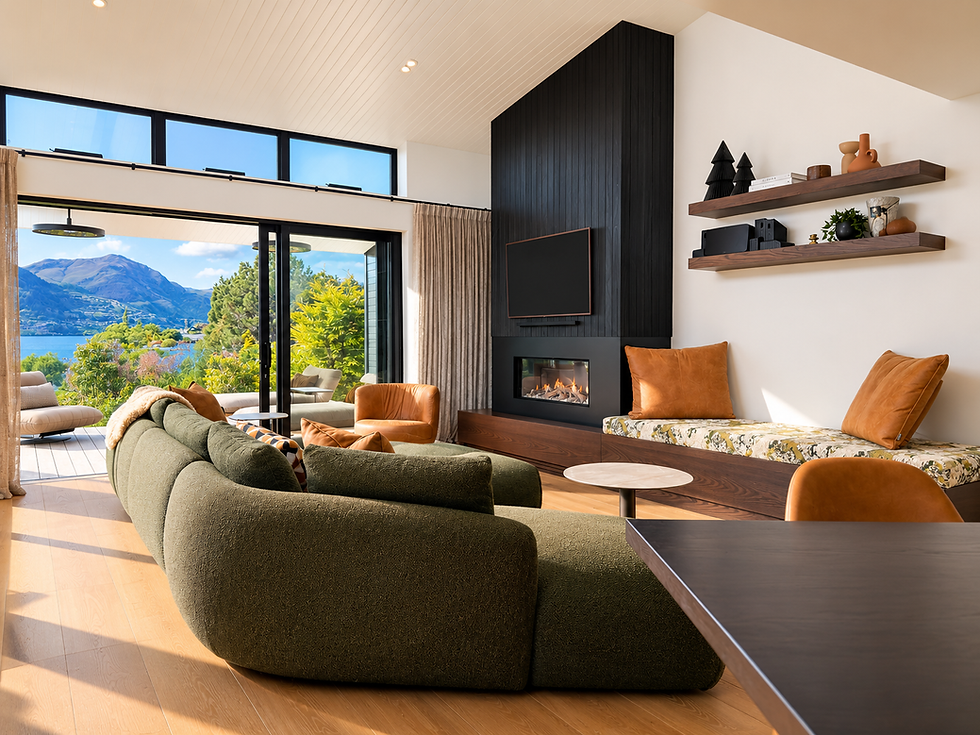 Modern Queenstown living room with lake views and fireplace