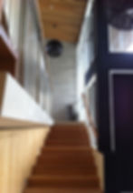 Bespoke wooden staircase in a modern interior design.