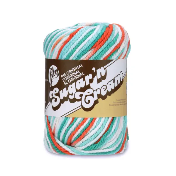 lily sugar'n cream original yarn in the colour ahoy ombre, a mix of white, bright red, and teals