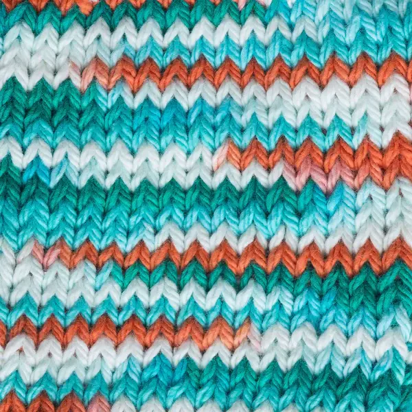 Thumbnail: lily sugar n' cream cone yarn in the colour ahoy ombre, showing a sample of it knitted