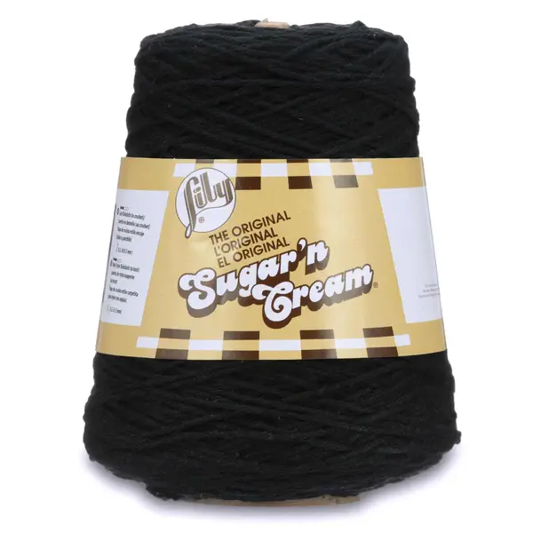 lily sugar n' cream cone yarn in the colour black, showing label