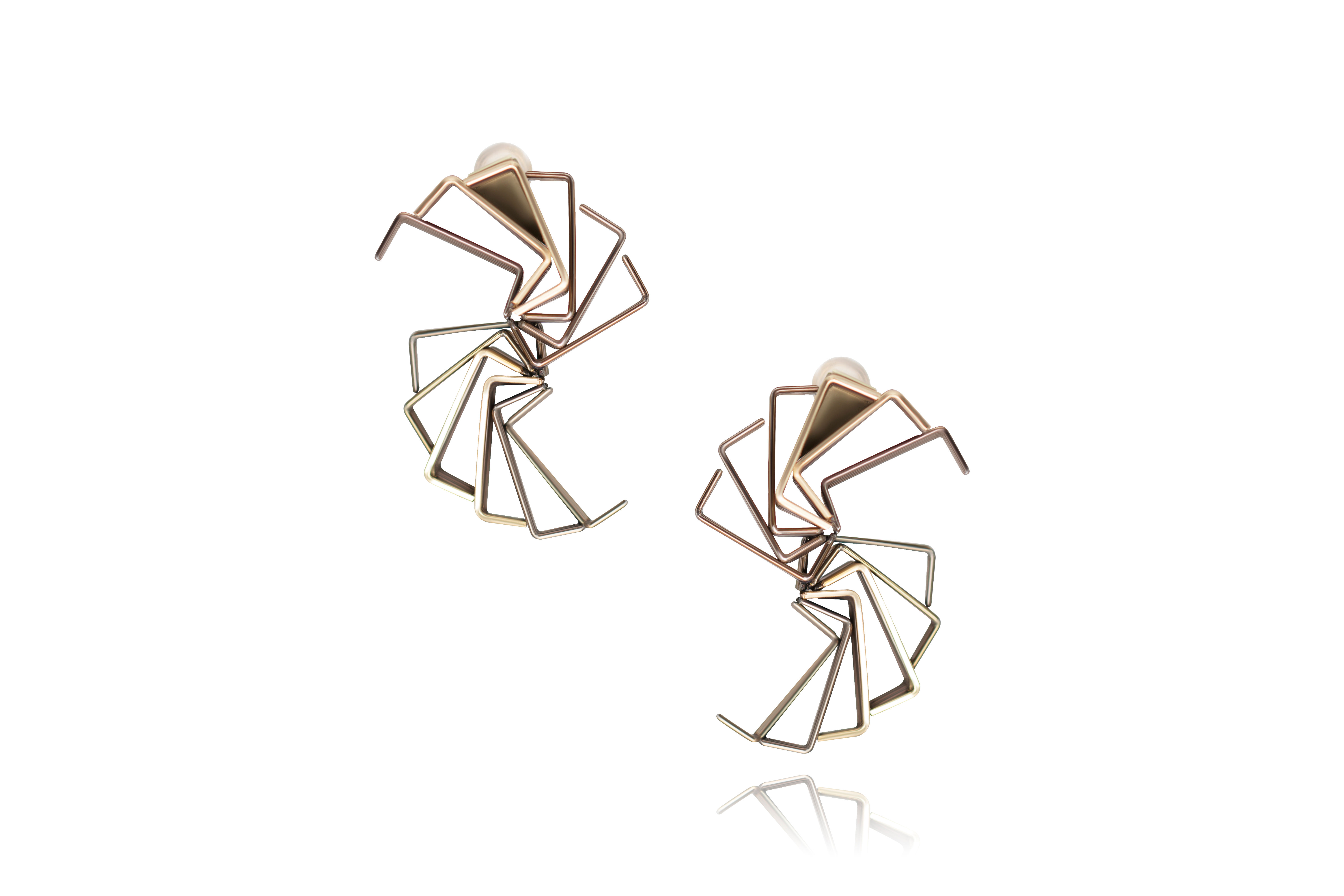 14k gold and stainless steel earring