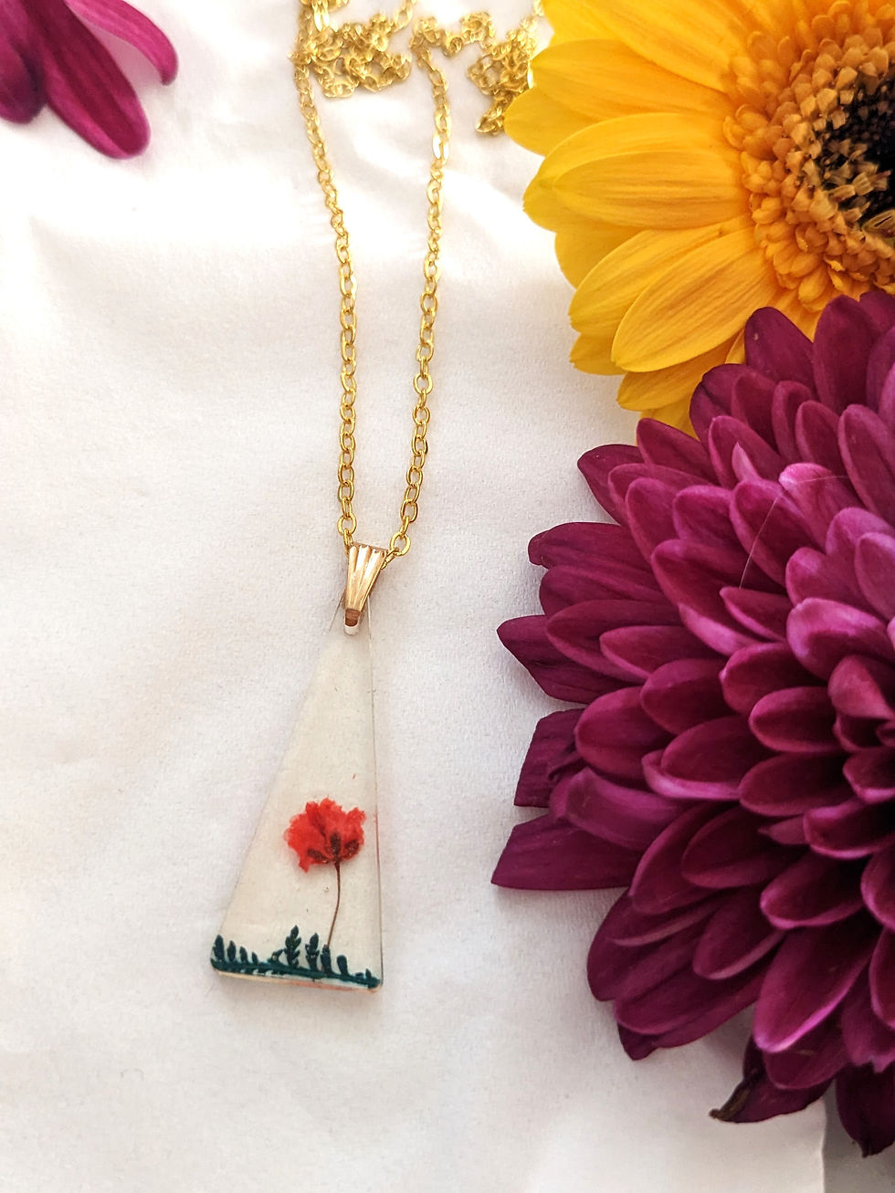 Thumbnail: Garden scene triangle necklace