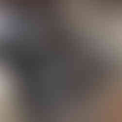 Before cleaning—kitchen stove and cooktop in Burnaby coated with construction dust from sanding.