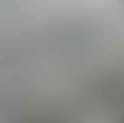 Unclean refrigerator crisper drawers collecting debris.