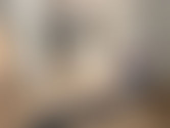 Clean laminate wood flooring and white baseboards in a freshly renovated room on 15th Ave Burnaby.