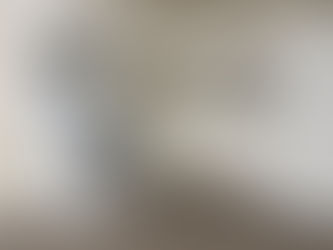 A completely sanitized and grease-free white kitchen inside a 2-bedroom basement suite, prepared for landlord inspection during a move-out cleaning in Surrey