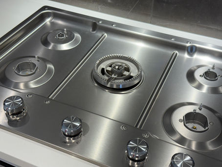 Stainless steel stove after professional deep cleaning in Coquitlam