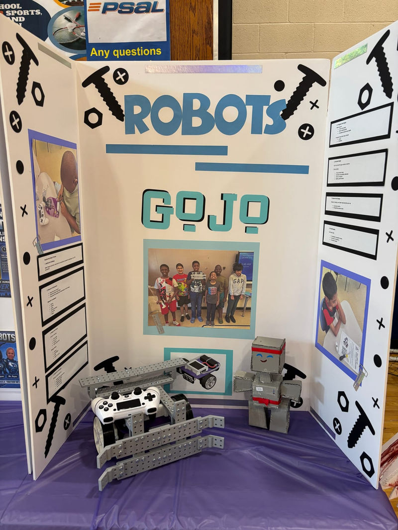 The Robots GOJO team board with their robot.