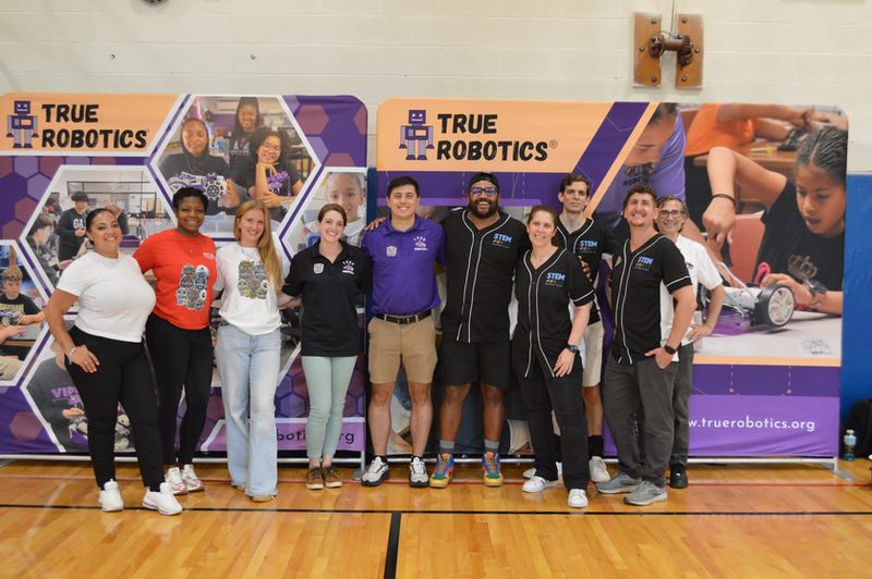 The True Robotics team with District 75 and P17X staff at the RoboRumble.