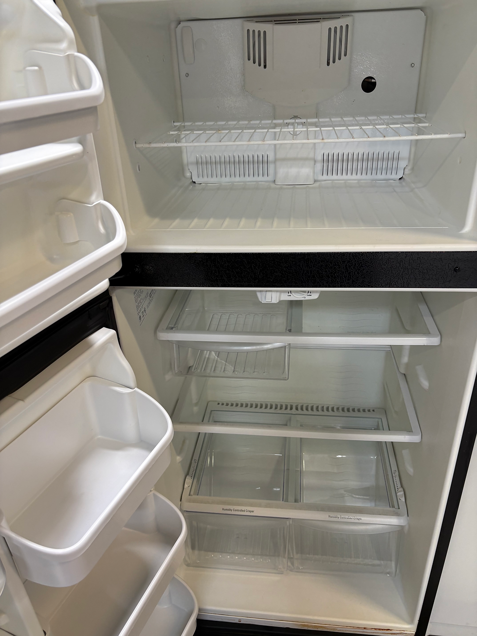 Thumbnail: Kenmore-30’ Black Top and bottom fridge.