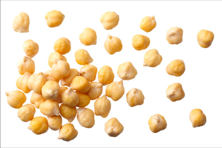 A scattered pile of dried chickpeas on a white background.
