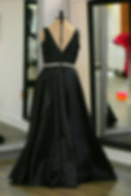 Thumbnail: Dylan & David's black gown with rhinestone waistband