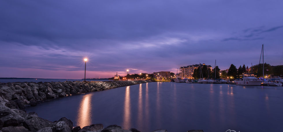 Violet Hues - Serene harbor twilight: calm water, lights reflecting - fine art photograph of a winding country road lined with vibrant autumn foliage, available as fine art prints and photo gifts through AMayesZing Photography Co.