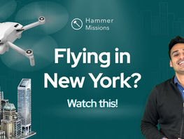 A drone flying near skyscrapers in a dense urban area built-up cities like London and New York