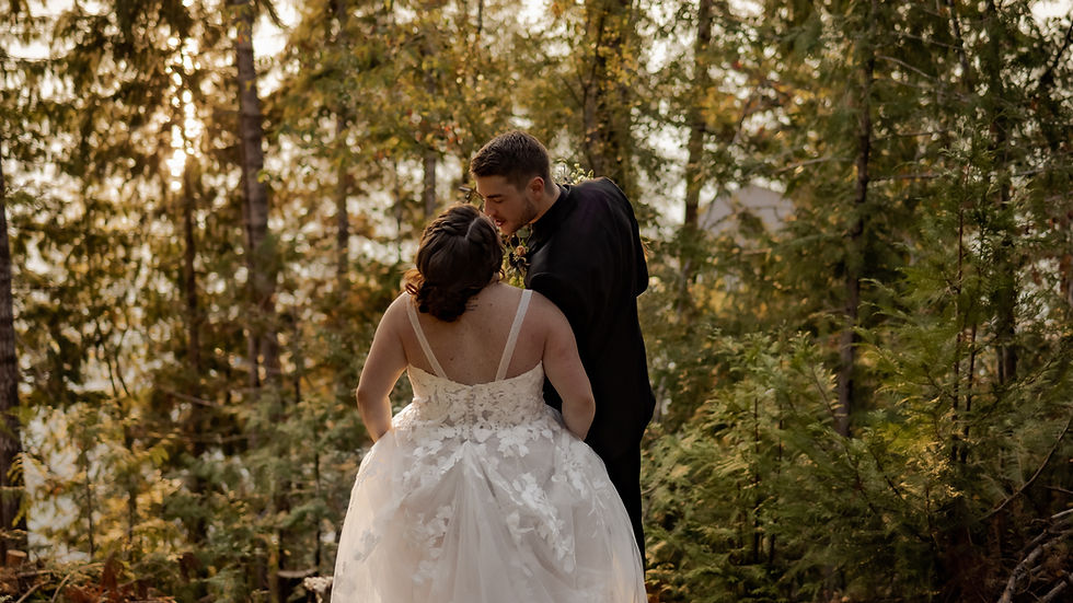 Couple walking down a staircase outdoors.