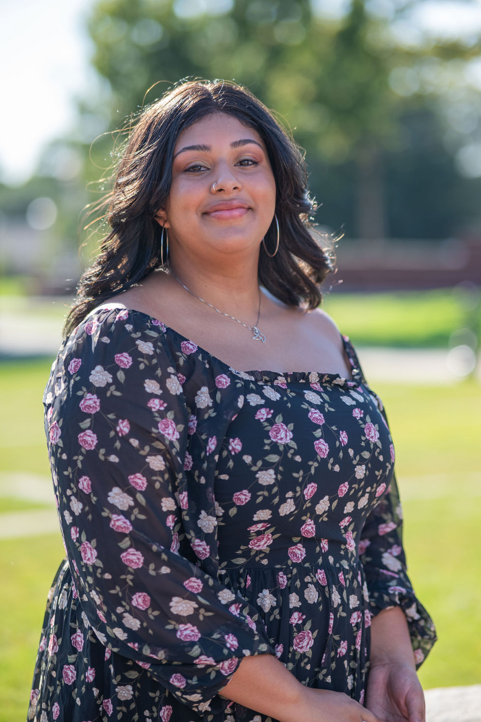 Outdoor portrait photography of a beautiful woman in a park.