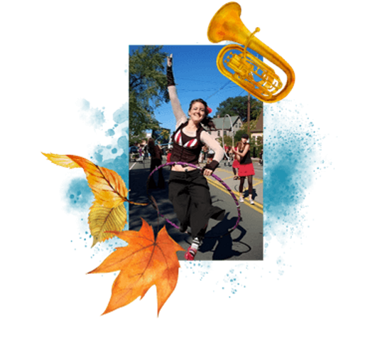 A joyful Justine Ramdas jumping through a hula hoop with handpainted autumn leaves and french horns accompanying it